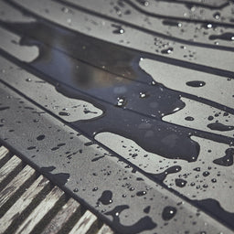 944708_ 944709 Detail Wasserspritzer auf wasserfester Matte