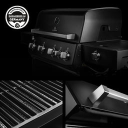 947140, 947147 Big FRED Deluxe 4-Brenner Gasgrill in Schwarz mit Gusseisenrosten, hochwertigem Griff und Materialdetails in Studioaufnahme