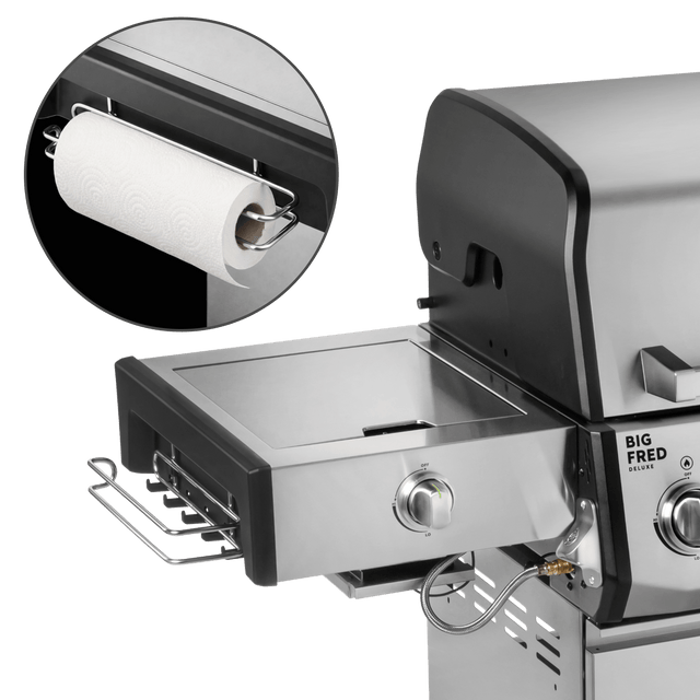 Küchenrollenhalter am Seitenkochfeld des Big Fred Deluxe montiert, mit eingesetzter Küchenrolle unter der Ablage
946757 946758 946759